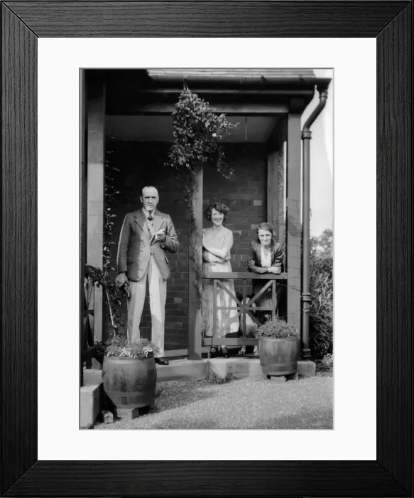 Framed Print : Three people outside a house Framed Print : Three people outside a house