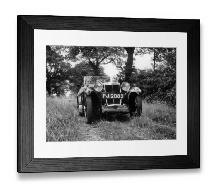 Framed Print : Man in a sports car in the country Framed Print : Man in a sports car in the country