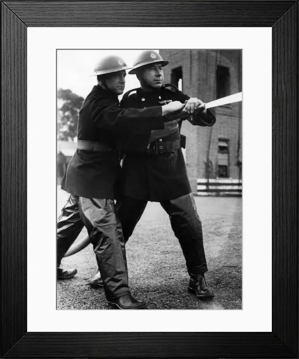 Framed Print : Firefighters taking part in a hose training drill, WW2 Framed Print : Firefighters taking part in a hose training drill, WW2