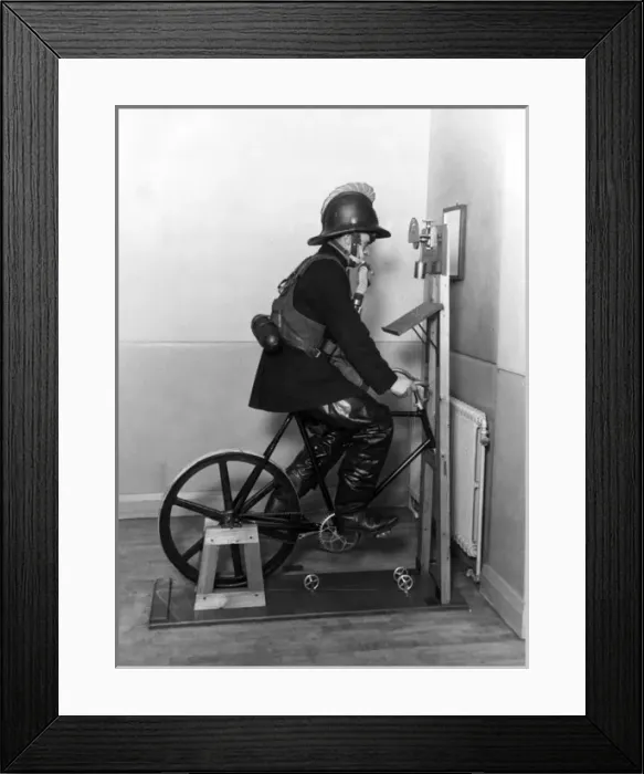Framed Print : Firefighter undergoing ergometer test Framed Print : Firefighter undergoing ergometer test