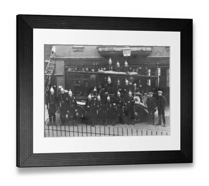 Framed Print : Firefighters and fire engine posing outside station Framed Print : Firefighters and fire engine posing outside station