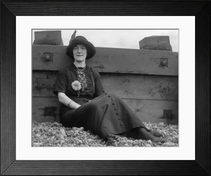 Framed Print : Woman on a pebbly beach Framed Print : Woman on a pebbly beach