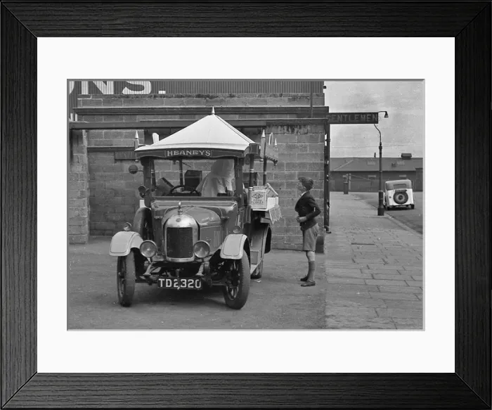 Framed Print : Boy buying food from a travelling shop Framed Print : Boy buying food from a travelling shop