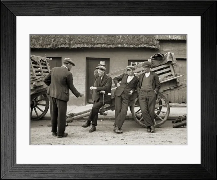 Framed Print : Men resting at the side of a cart Framed Print : Men resting at the side of a cart