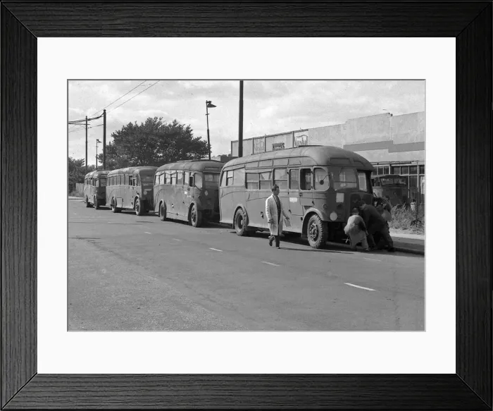 Framed Print : Four coaches outside Vauxhall building Framed Print : Four coaches outside Vauxhall building