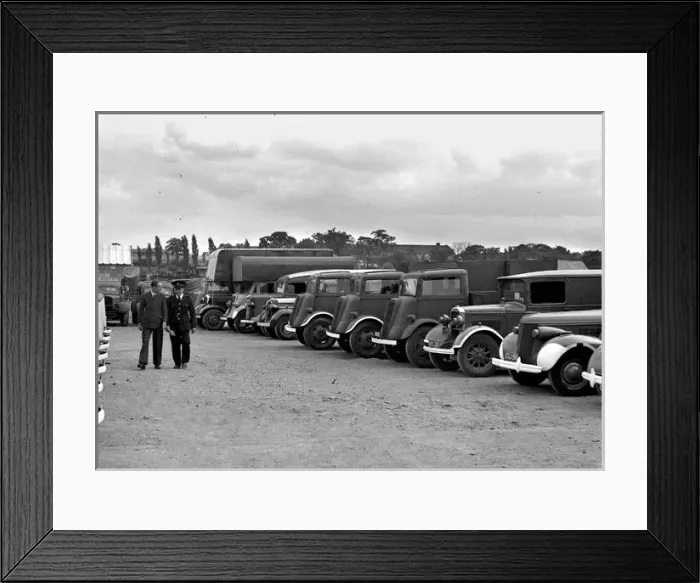 Framed Print : Two men in a vehicle park Framed Print : Two men in a vehicle park