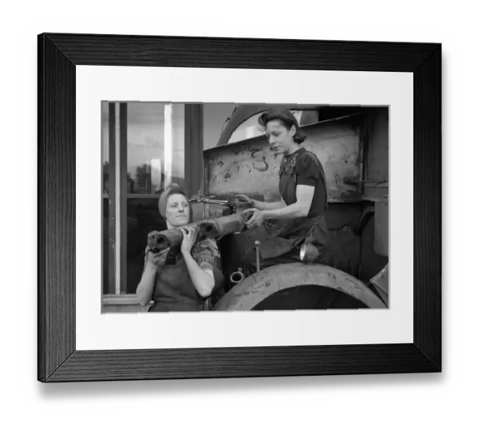 Framed Print : Two women working in a garage Framed Print : Two women working in a garage