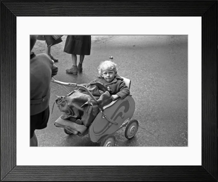 Framed Print : Child in a pushchair Framed Print : Child in a pushchair