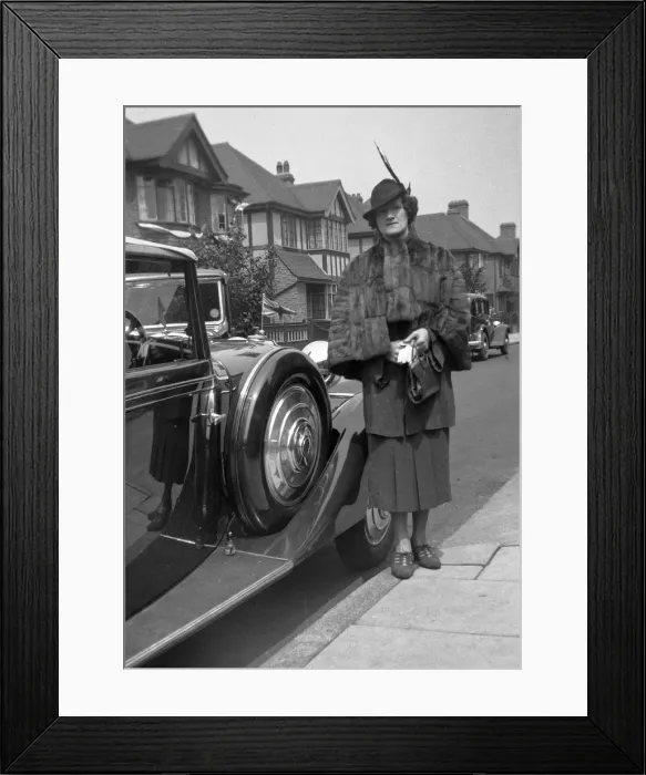 Framed Print : Middle class woman in residential street Framed Print : Middle class woman in residential street