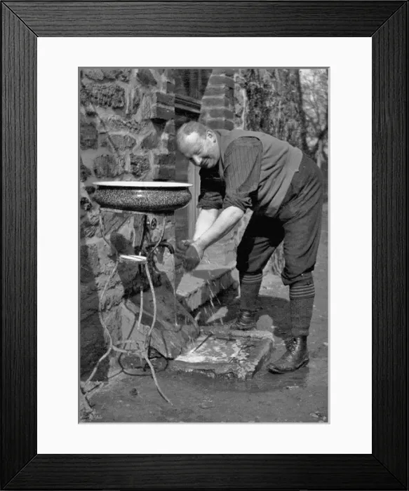 Framed Print : Man washing hands after gardening Framed Print : Man washing hands after gardening