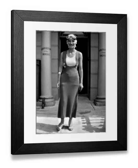 Framed Print : Woman in goggles outside hotel Framed Print : Woman in goggles outside hotel