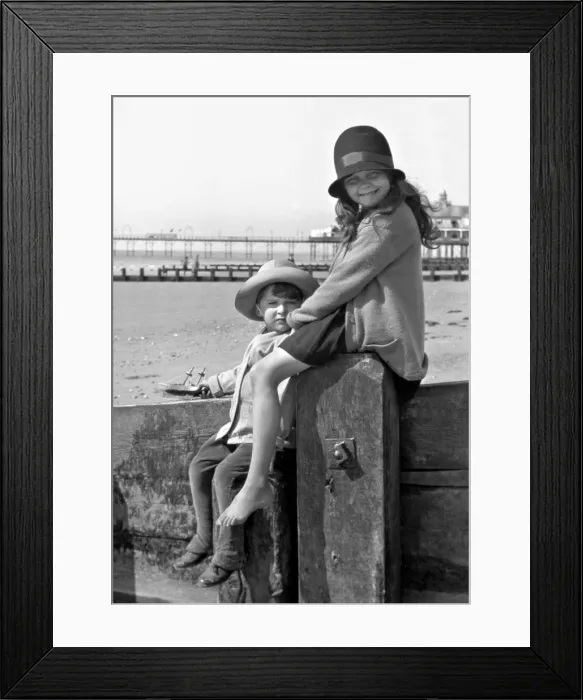 Framed Print : Girl and boy at the seaside Framed Print : Girl and boy at the seaside