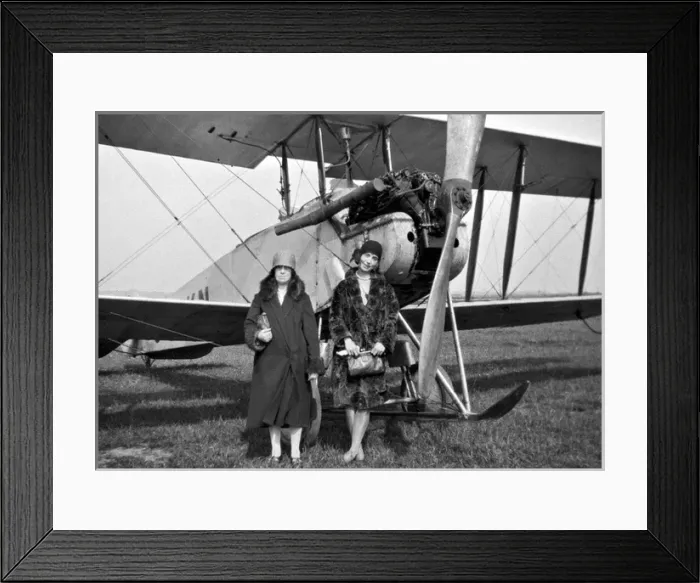 Framed Print : Two women in front of biplane Framed Print : Two women in front of biplane