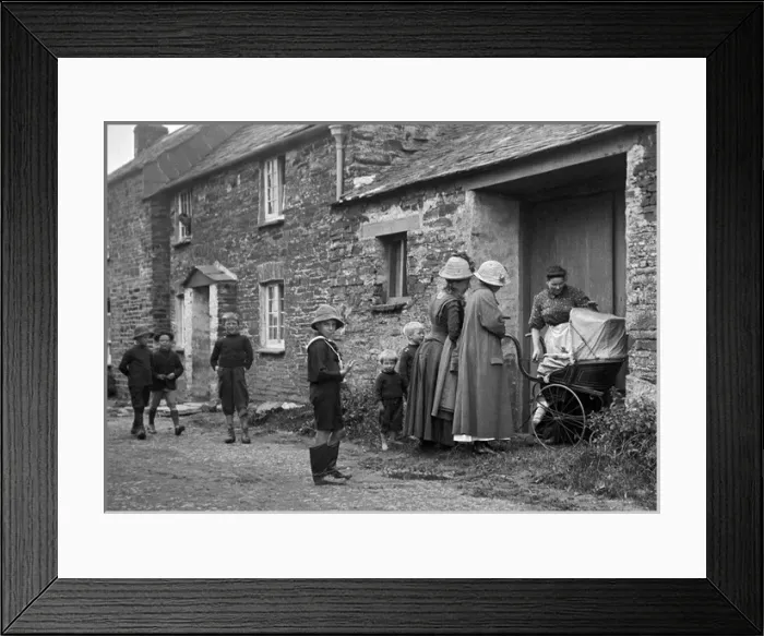 Framed Print : Women and pram in village street Framed Print : Women and pram in village street