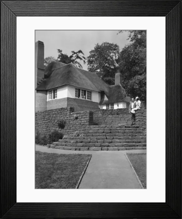 Framed Print : Couple in cottage garden Framed Print : Couple in cottage garden