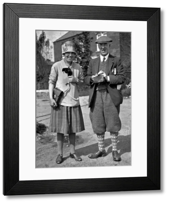 Framed Print : Middle-aged couple in a garden Framed Print : Middle-aged couple in a garden