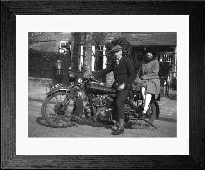 Framed Print : Couple on a large motorbike Framed Print : Couple on a large motorbike