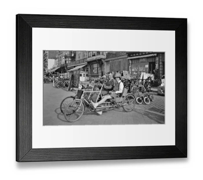 Framed Print : Couple on a two-seater cycle, Belgium Framed Print : Couple on a two-seater cycle, Belgium