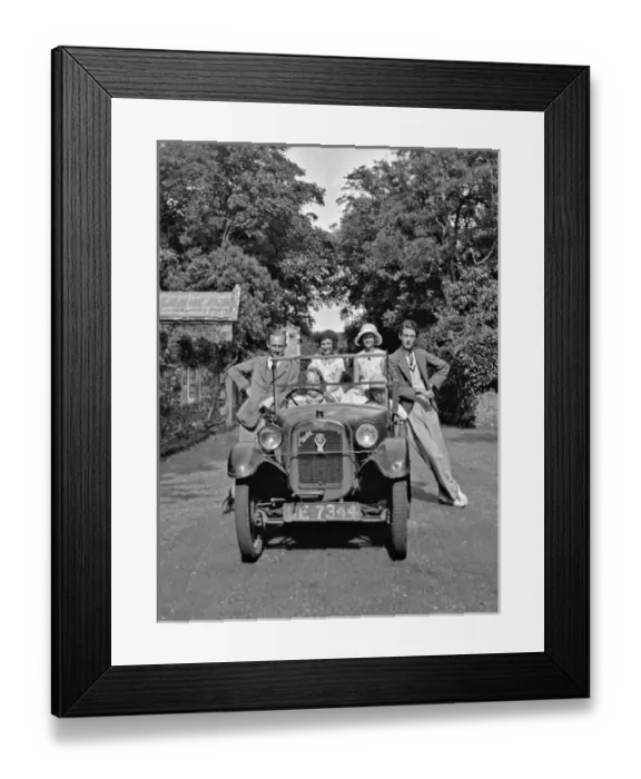 Framed Print : People posing with Austin car Framed Print : People posing with Austin car