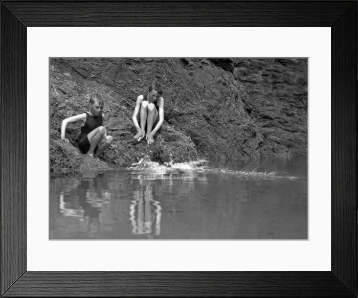Framed Print : Two boys in swimsuits sitting on a rock Framed Print : Two boys in swimsuits sitting on a rock