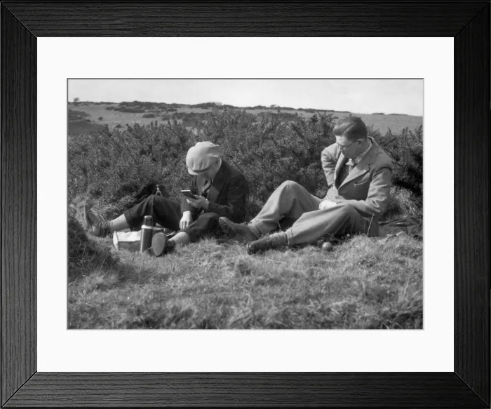 Framed Print : Two men enjoying a hilltop picnic Framed Print : Two men enjoying a hilltop picnic