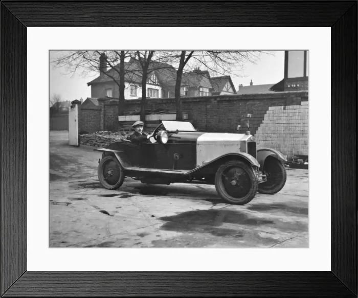 Framed Print : Man in an open-topped sports car Framed Print : Man in an open-topped sports car