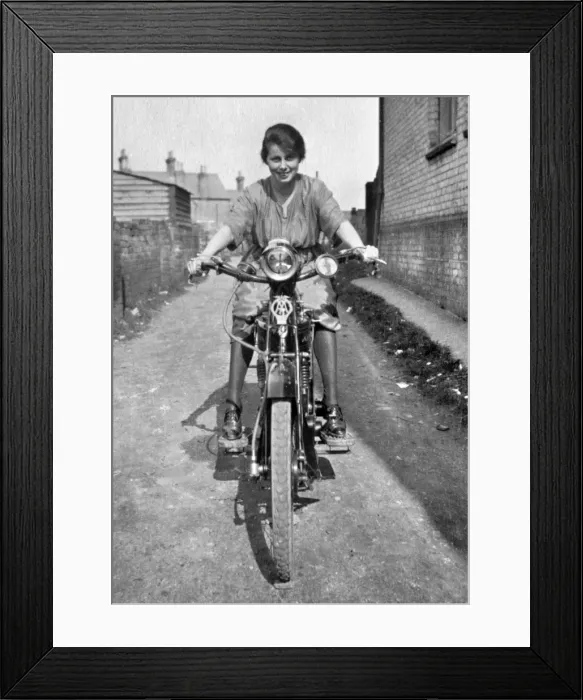 Framed Print : Woman on a motorbike Framed Print : Woman on a motorbike