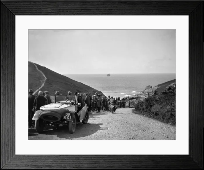 Framed Print : People on road sloping down to the sea Framed Print : People on road sloping down to the sea