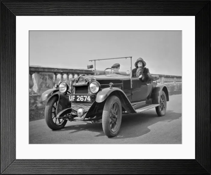 Framed Print : Couple in an open-topped car Framed Print : Couple in an open-topped car