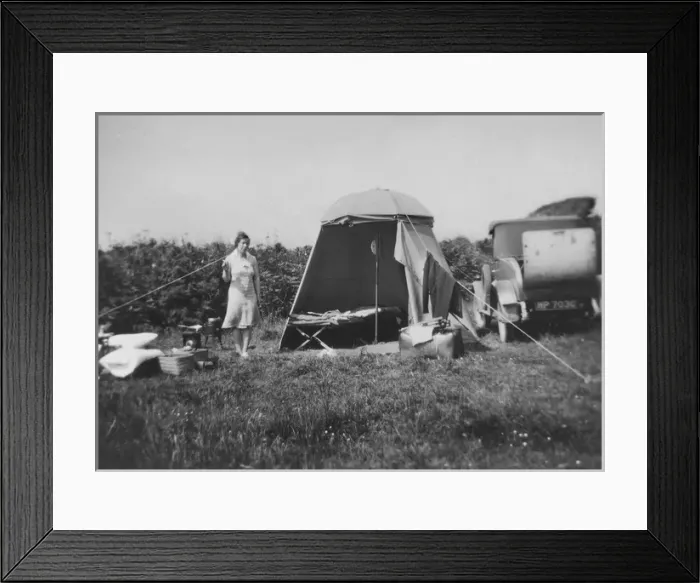 Framed Print : Woman with tent and parked car Framed Print : Woman with tent and parked car
