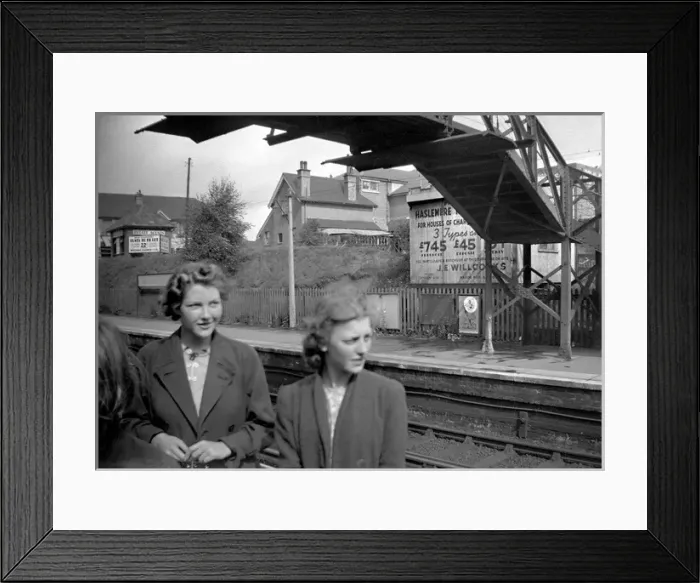 Framed Print : Two women at a railway station, South London Framed Print : Two women at a railway station, South London