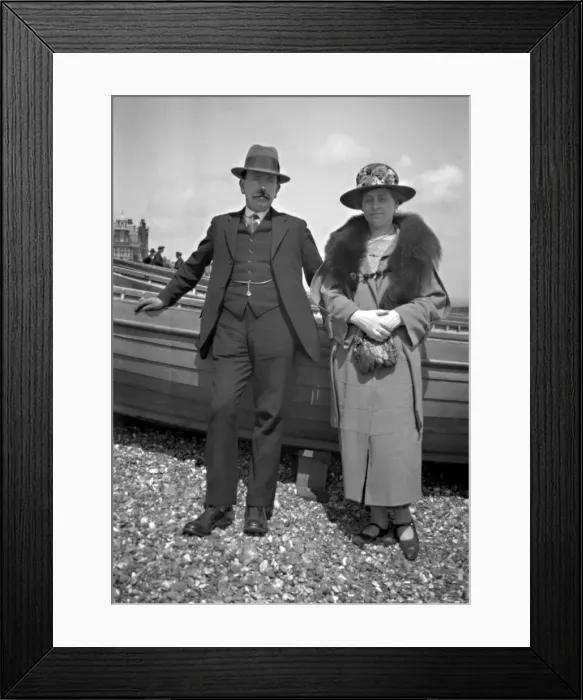 Framed Print : Middle-aged couple on a pebbly beach Framed Print : Middle-aged couple on a pebbly beach