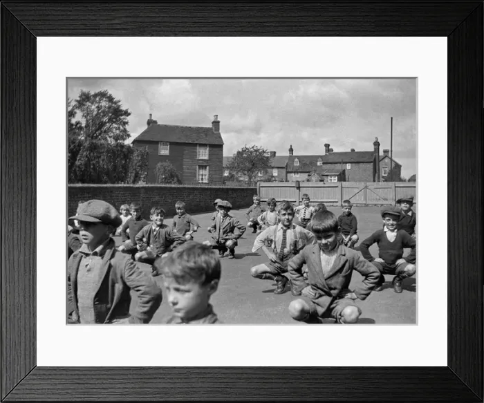 Framed Print : Boys exercising in school playground Framed Print : Boys exercising in school playground