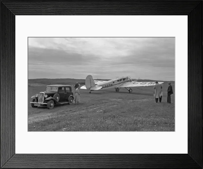 Framed Print : People with car and light aircraft, Scotland Framed Print : People with car and light aircraft, Scotland