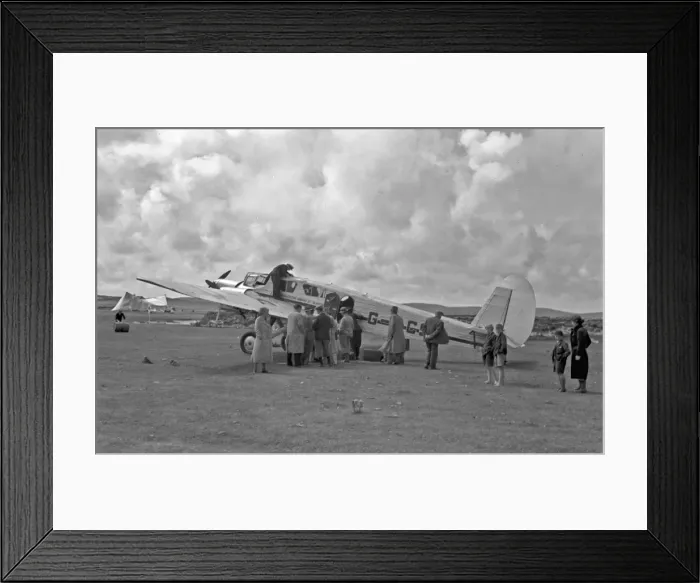 Framed Print : People on airfield with light aircraft, Scotland Framed Print : People on airfield with light aircraft, Scotland