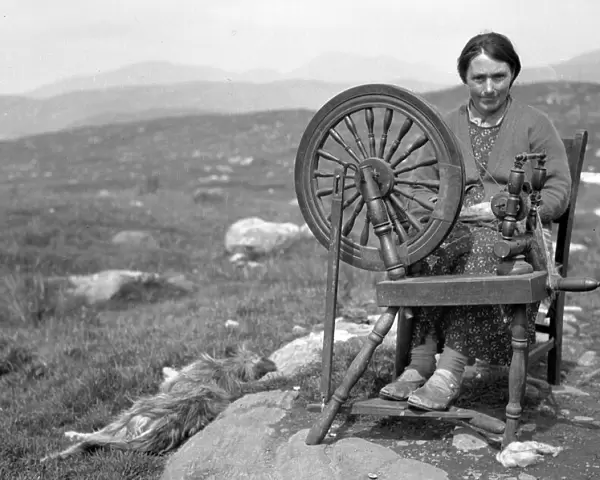 Woman with spinning wheel, Isle of Harris, Scotland