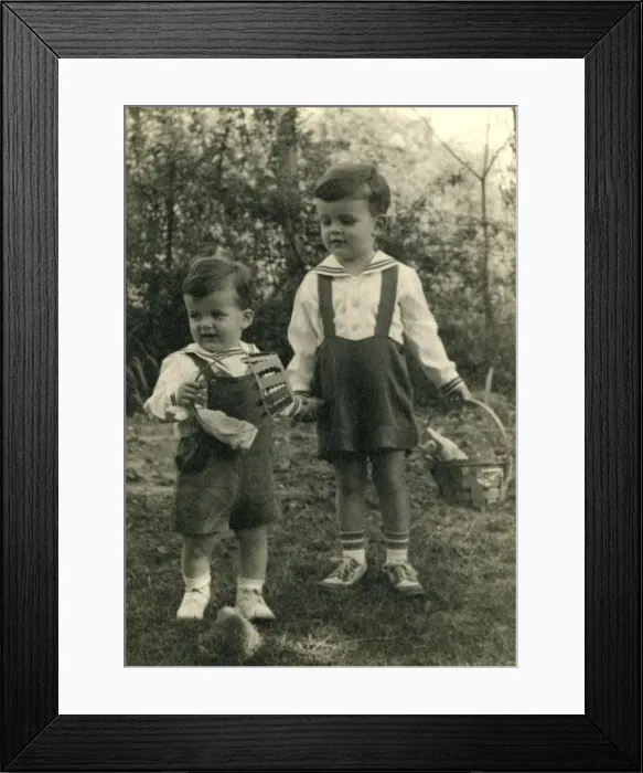 Framed Print : Two young boys on an Easter egg hunt Framed Print : Two young boys on an Easter egg hunt