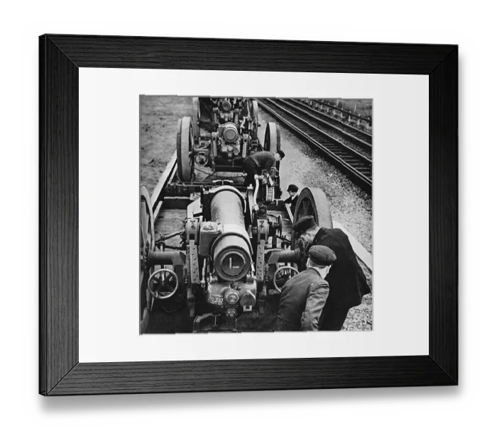 Framed Print : Howitzers being unloaded at a railway station, 1939 Framed Print : Howitzers being unloaded at a railway station, 1939