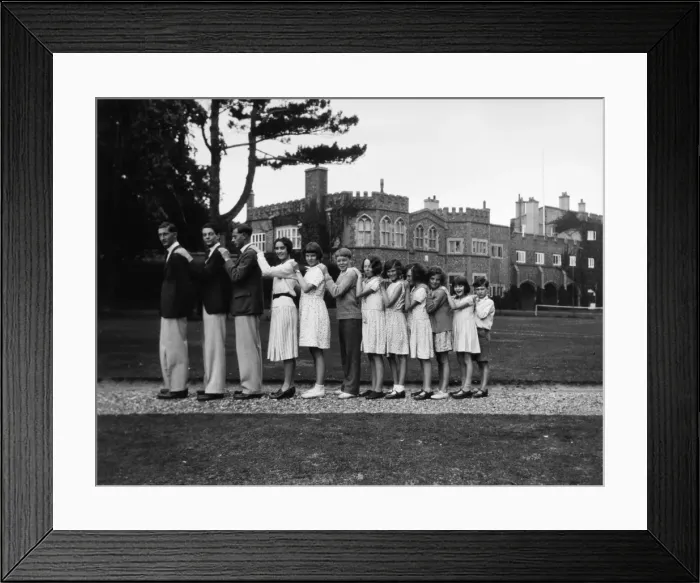 Framed Print : Twelve young people standing in a line Framed Print : Twelve young people standing in a line