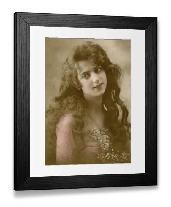 Framed Print : Woman in pink dress holding a bunch of lily of the valley Framed Print : Woman in pink dress holding a bunch of lily of the valley