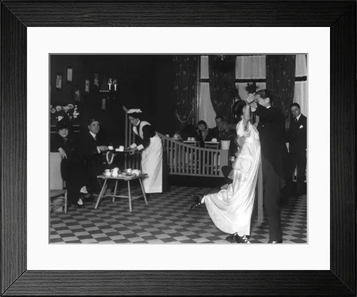 Framed Print : A couple dressed in their finery, dancing Framed Print : A couple dressed in their finery, dancing