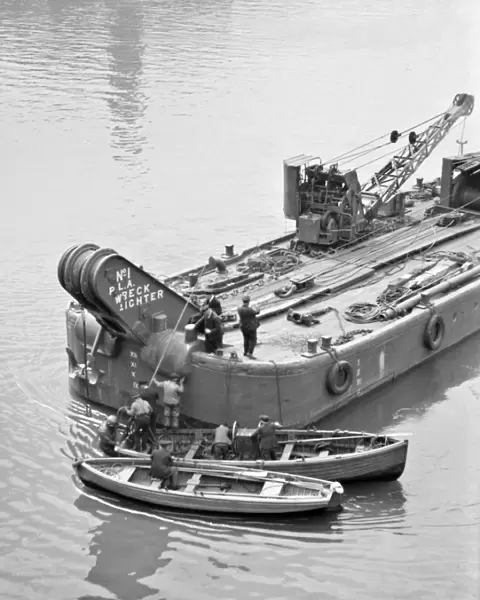 Wreck lighter and two boats, London