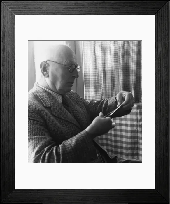 Framed Print : H. L. Oakley cutting a silhouette Framed Print : H. L. Oakley cutting a silhouette