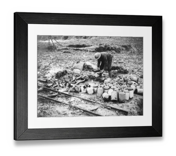 Framed Print : British soldier cleaning up debris, Western Front, WW1 Framed Print : British soldier cleaning up debris, Western Front, WW1