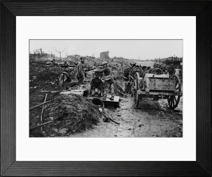 Framed Print : British soldiers drawing water in a captured village, WW1 Framed Print : British soldiers drawing water in a captured village, WW1