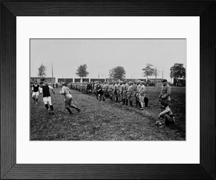 Framed Print : British and French soldiers playing football, WW1 Framed Print : British and French soldiers playing football, WW1