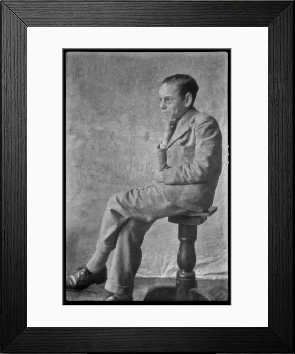 Framed Print : Man sitting on a stool Framed Print : Man sitting on a stool