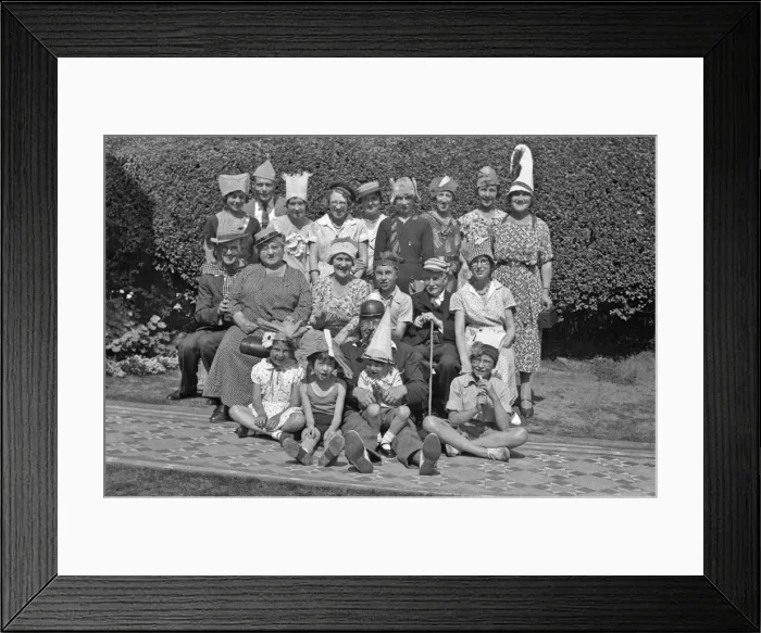 Framed Print : Group of people in party hats Framed Print : Group of people in party hats