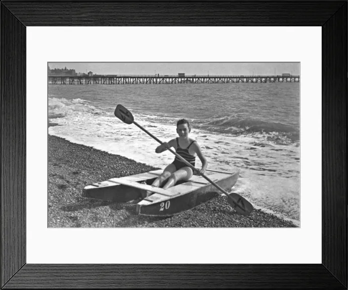 Framed Print : Boy at the seaside on a raft Framed Print : Boy at the seaside on a raft