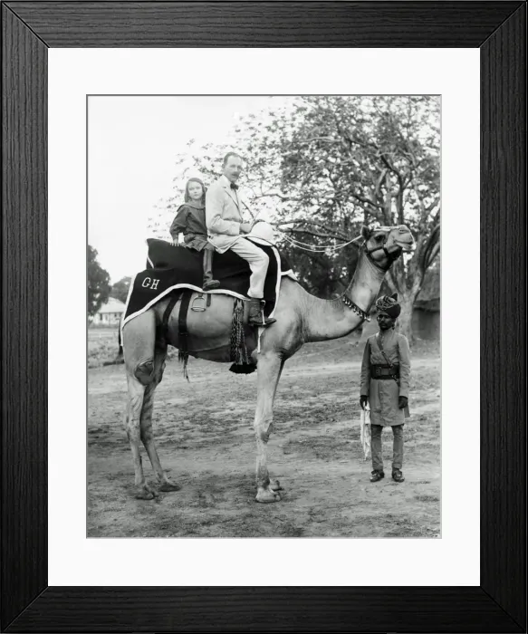 Framed Print : European man and daughter on camel, India Framed Print : European man and daughter on camel, India